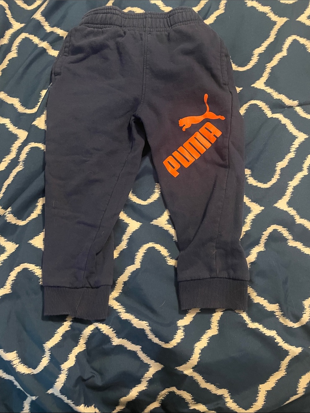 Puma Navy Sweat Joggers with Bright Orange Logo